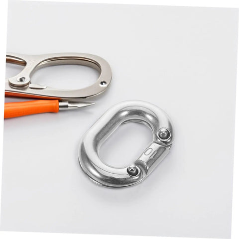 Pro Grade 316 Marine Stainless Steel Chain Link Connector Quick Connect Clip on white background next to scissors.