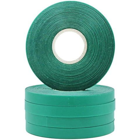 Green Plant Tie Tape Rolls 6 Mil Thick Half Inch Wide 200 Feet Each for Large Tapeners stacked for securing vines and trees