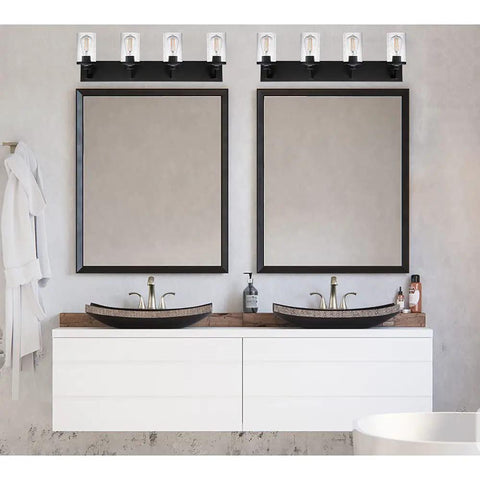 Dope Matte Black Bath Vanity Light With Seeded Glass Shade Modern Wall Mounted Sconce above dual mirrors in bathroom setting