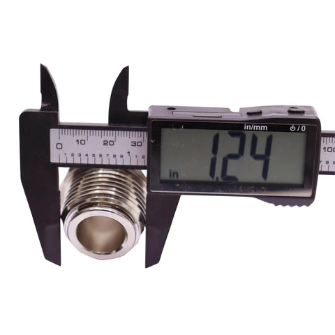 Caliper measuring 1-inch NPT fuel swivel connector for precise sizing