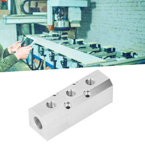 Aluminum Air Manifold Block 40x40mm heavy duty high flow with G1/2 inlet and G1/4 outlet in factory automation setting.