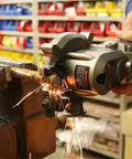 High Power Cordless Rebar Cutter With Battery Included For Easy DIY Metal Cutting And Construction Projects cutting rebar in a vise.