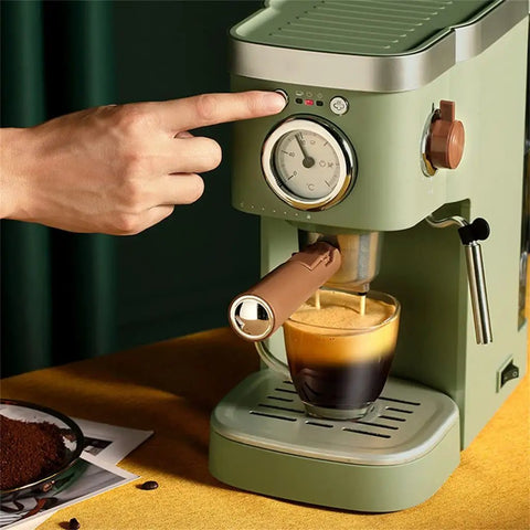 Heavy Duty No Hassle Electric Cappuccino Maker With Smooth Pour Milk Frother and Quick Adjust Brew Settings Removable Drip Tray, finger pressing brew button.