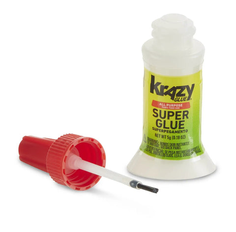 Multipurpose Brush On Super Glue Six Count Pack Quick Drying Liquid Adhesive Zero Hassle Applicator Knocks Out Instant Grab For Rapid Home Fixes And Diy Projects Dang Strong Hold, bottle with applicator top.