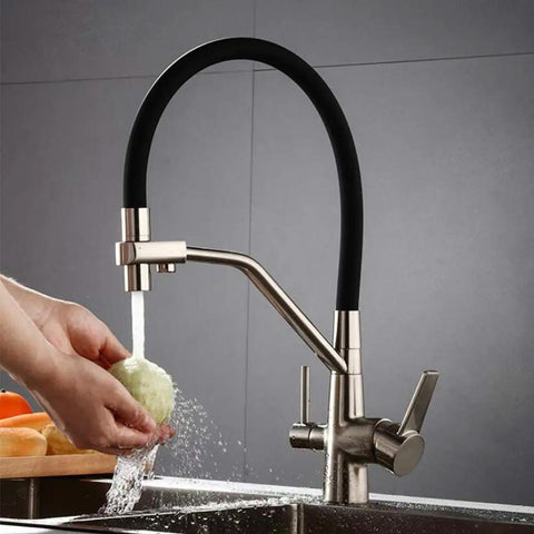 GAZOGJ 3-Way Kitchen Faucet with 360°Rotating Extendable Shower Head, sleek design with a black and chrome finish, used for washing vegetables.