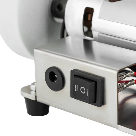 Close-up of Mini Belt Sander Grinder With 7 Speed Adjustable Settings control panel showcasing switch and power connections.