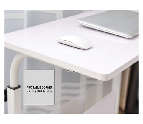 Close-up of Adjustable Rolling Laptop Table with Smooth Ride Wheels for Bed Sofa or Living Room mobile workstation surface.