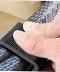 Close-up of a hand installing 8 Pack Outdoor Furniture Clips And Connectors For Rattan Wicker Chairs And Sectional Sofas, No More Sliding.