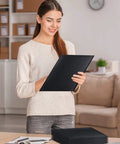 Woman holding Five Pack Black Waterproof Bubble Mailers With Tear And Shake Resistant Envelope Bags For Shipping Jewelry Glass Art