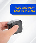 Hand holding Hassle Free 220V AC To 12V DC Power Inverter With Universal Cigarette Lighter Plug, compact, easy to install.