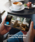 Live video feed from Mini Indoor Plug In Smart Security Cam With 1080P HD Video Night Vision Motion Detection Two Way Audio Easy Setup Works With Alexa 1 Camera Black For Home Security on smartphone screen