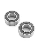 Close-up of Wheel Bearing And Seal Kit Front And Rear For Harley Touring Road Glide Road King Street Glide 2000 2007 Sportster XL1200 2004 2007 Dyna FX 2000 2007 Direct Replacement Bearings And Seals showing two metal bearings on a white background.