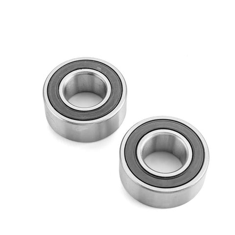 Close-up of Wheel Bearing And Seal Kit Front And Rear For Harley Touring Road Glide Road King Street Glide 2000 2007 Sportster XL1200 2004 2007 Dyna FX 2000 2007 Direct Replacement Bearings And Seals showing two metal bearings on a white background.