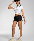 Woman wearing Women’s Running Shorts With Built In Liner And Quick Dry Mesh Lightweight Athletic Gym Shorts With Zip Pocket Low Rise Fit