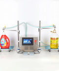 Ready To Roll Double Head Liquid Filler Machine Featuring Zero Drip Precision Valves And Hassle Free Height Adjustments.