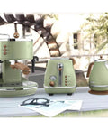 Retro Semi Automatic Coffee Machine With Built In Grinder And 15 Bar Pressure For Buttery Smooth Lattes And Cappuccinos on a table with kettle and toaster.