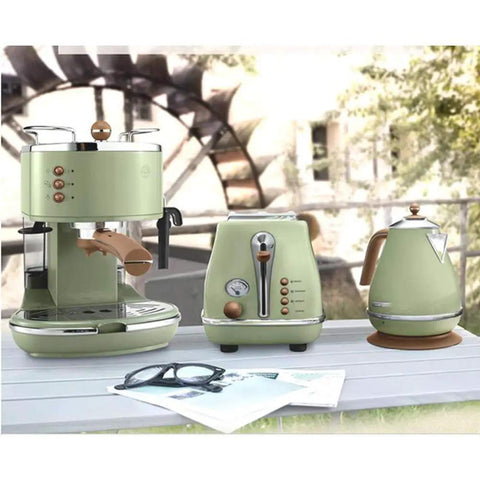 Retro Semi Automatic Coffee Machine With Built In Grinder And 15 Bar Pressure For Buttery Smooth Lattes And Cappuccinos on a table with kettle and toaster.