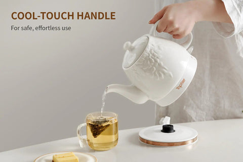 Electric Ceramic Tea Kettle With 1 Liter Capacity, Boil Water In A Snap, Detachable 360 Degree Swivel Base, shown pouring tea
