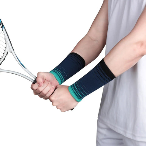 Person wearing Mens Sports Wrist Guard For Weightlifting And Gym Workouts Durable Nylon Breathable Wristband holding tennis racket