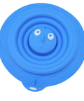 Drain Unclogger Flexible Bath Drain Cover Sealing Stopper in blue silicone with a whimsical design, top view.