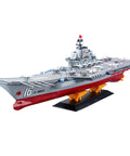 Dual-Motor 30 Km/H RC Battleship With Waterproof Hull And Sealed Cabin, model on stand showcasing detailed deck and structure