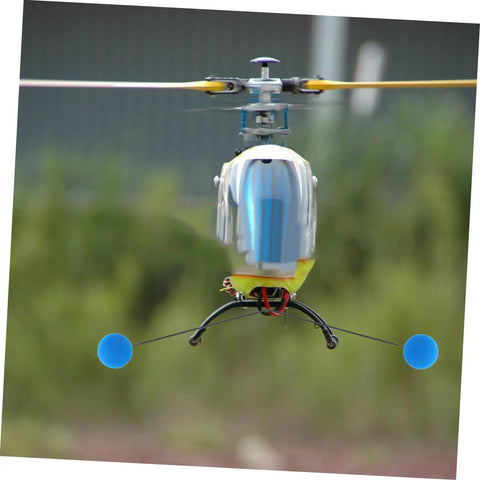 Close-up of Three Set RC Helicopter Training Kit with sponge foam for airplanes and helis in flight, universal gear visible