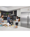 Sleek Smudge Proof Stainless Steel Upright Freezer With 18.9 Cubic Feet Storage And Smooth Glide Out Ice Maker powered by EvenTemp Cooling in modern kitchen.
