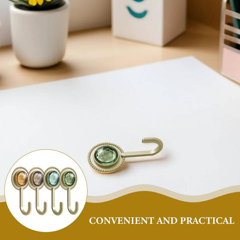 Slick Four Pack Adhesive Wall Hooks For Hanging Towels And Robes With Knockout Grip No Drilling Required Super Quick Mount For Bathroom Kitchen Or Entryway Storage, showing a green decorative hook.