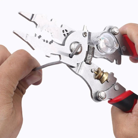 Heavy Duty Electrician Wire Stripper Tools With Built In Voltage Tester And Crimping Pliers in hand, showcasing ergonomic design and alloy jaws.
