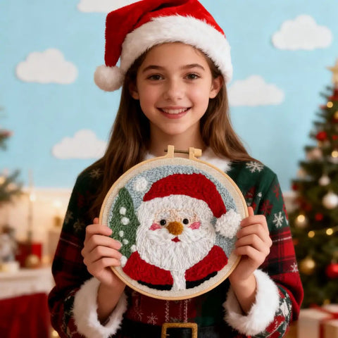 Child holding Santa Claus embroidery from Beginner Punch Needle Kit Santa Claus With Hoop Craft Embroidery Set Easy For Adults And Kids