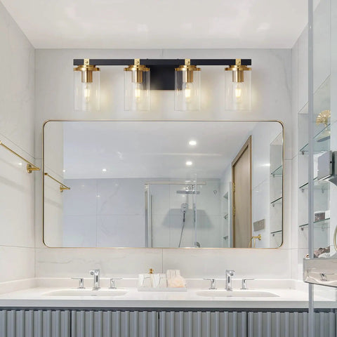 4 Light Modern Vanity Light Fixtures For Bathroom In Matte Black And Brushed Gold With Clear Glass Shades Over Mirror