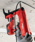 Worker installing ceiling with tool for High Performance X-P 17 B3 MX Bulk Nails, 11 16 Inch Shank, Heavy-Duty Collated Nails.