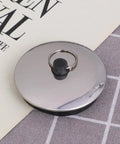 2pcs Rubber Bathtub Drain Stopper Black for Bathroom and Laundry, flat metal cover with rubber plug, ideal for effective drainage.