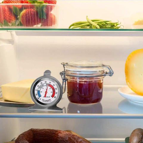 2-Pack Fridge Thermometer With Large Dial And Red Indicator in refrigerator beside cheese and jar, ideal for kitchen use.