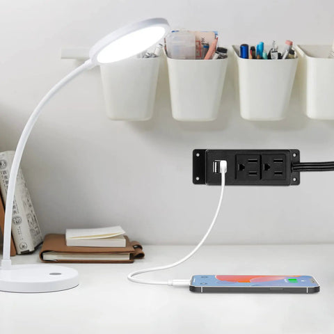 Mountable Power Strip With USB Ports And 2 AC Outlets, 6.56Ft Extension Cord on desk with phone charging, under lamp