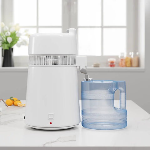 Top Notch Countertop Water Distiller With Rock Solid 900 Watt Heating Coil And Generous 1.6 Gallon Glass Pitcher on kitchen table.