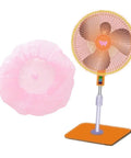 4 Pack Family Baby Kid Finger Protectors For Fans With Dustproof Mesh Covers Butterfly Design Safe Washable Lightweight Safety Fan Guard For Kids And Babies Pink, pink fan cover with butterfly design next to a fan.