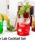 Low Form Borosilicate Glass Beaker Set With 25ml 50ml 100ml 200ml Graduated Beakers used as cocktail glasses with garnishes.