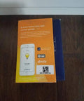 Back of MyQ Smart Garage Hub WiFi Enabled Garage Controller package showing app control and compatibility details.
