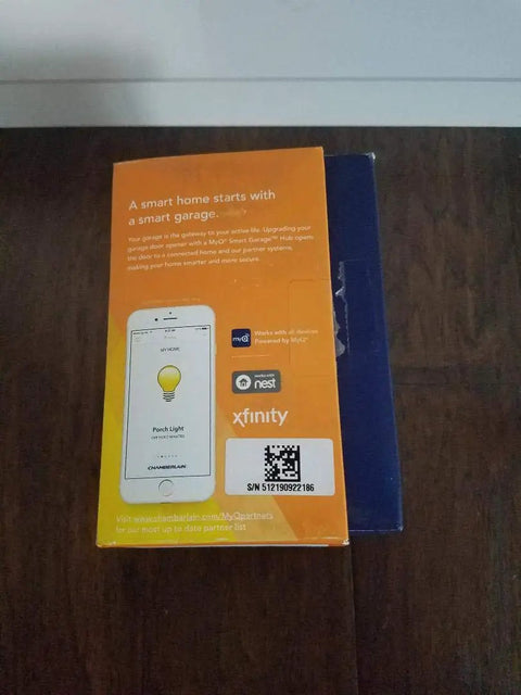 Back of MyQ Smart Garage Hub WiFi Enabled Garage Controller package showing app control and compatibility details.