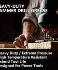 Person using a power tool with Hammer Drill Grease 50g Power Tool Lubricant Anti Seize Squeak Prevention Rust Protection For Rotary Bits and Motors