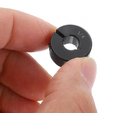 Sixteen Pack Split Shaft Collar Set One Piece Clamp With One Quarter Inch Bore Eleven Sixteenth Inch OD Five Sixteenth Inch Thick Black Oxide Steel Set Screw Lock Heavy Duty Machine Shaft Hardware, close-up