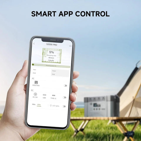 Smartphone showing app control for Beefy Capacity Portable Power Station S2000 Pro 1520Wh LiFePO4 Solar Generator at campsite