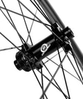 Close-up of CX9 disc hub on 38mm Tubeless Disc Brake Road Wheelset 700c Carbon Fiber Toray T700 With 25mm Rim Shimano 8-12 Speed