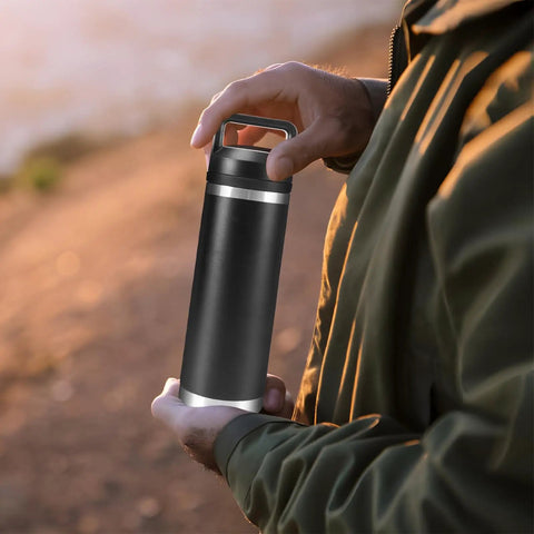 Person holding a black Rambler cup with Screw Top Lid Replacement For Yeti Rambler Cups, No Cap Leakproof Chug Cap That Fits All Rambler 18oz 26oz 36oz 46oz 64oz, durable and shatterproof
