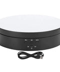 Spiffy Omquot Electric Rotating Jewelry Stand With 360 Degree Swivel Plate And Usb Charging Port For Watches Cosmetics And Toys In Sleek Black Finish, showing USB port and control buttons.