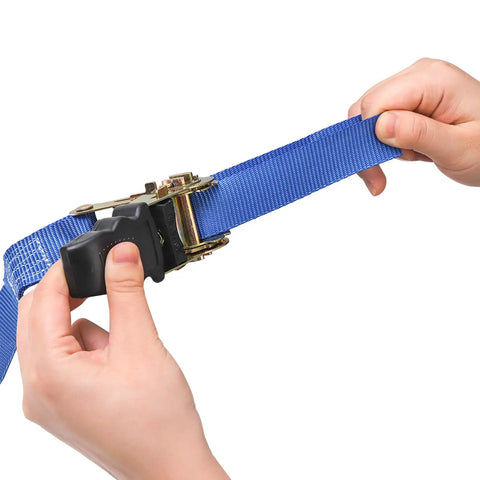 Hands adjusting blue ratchet strap from 18 Piece Tree Climbing Holds Set With Six Ten Foot Ratchet Straps For Outdoor Tree Climbing Kit