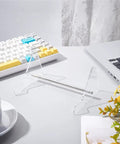 Clear Acrylic Keyboard Stand 1 Tier Desk Holder with a detachable metal bar on a white desk next to a keyboard and laptop.