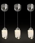 Three Pack Levitate LED Pendant Lights With Unique Ice Design in Brushed Nickel, Displayed Together Against Dark Background
