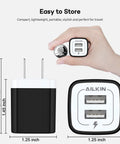 Hand holding compact Dual USB Wall Charger Fast Charge Block Two Port Power Cube 2.1A Total for iPhone, Samsung, and more.